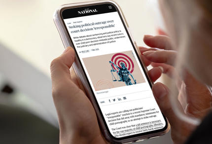 Close up of a women reading an article on her phone